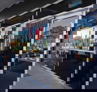 Charcoal Chick-inn Four Season's - Accommodation Broadbeach